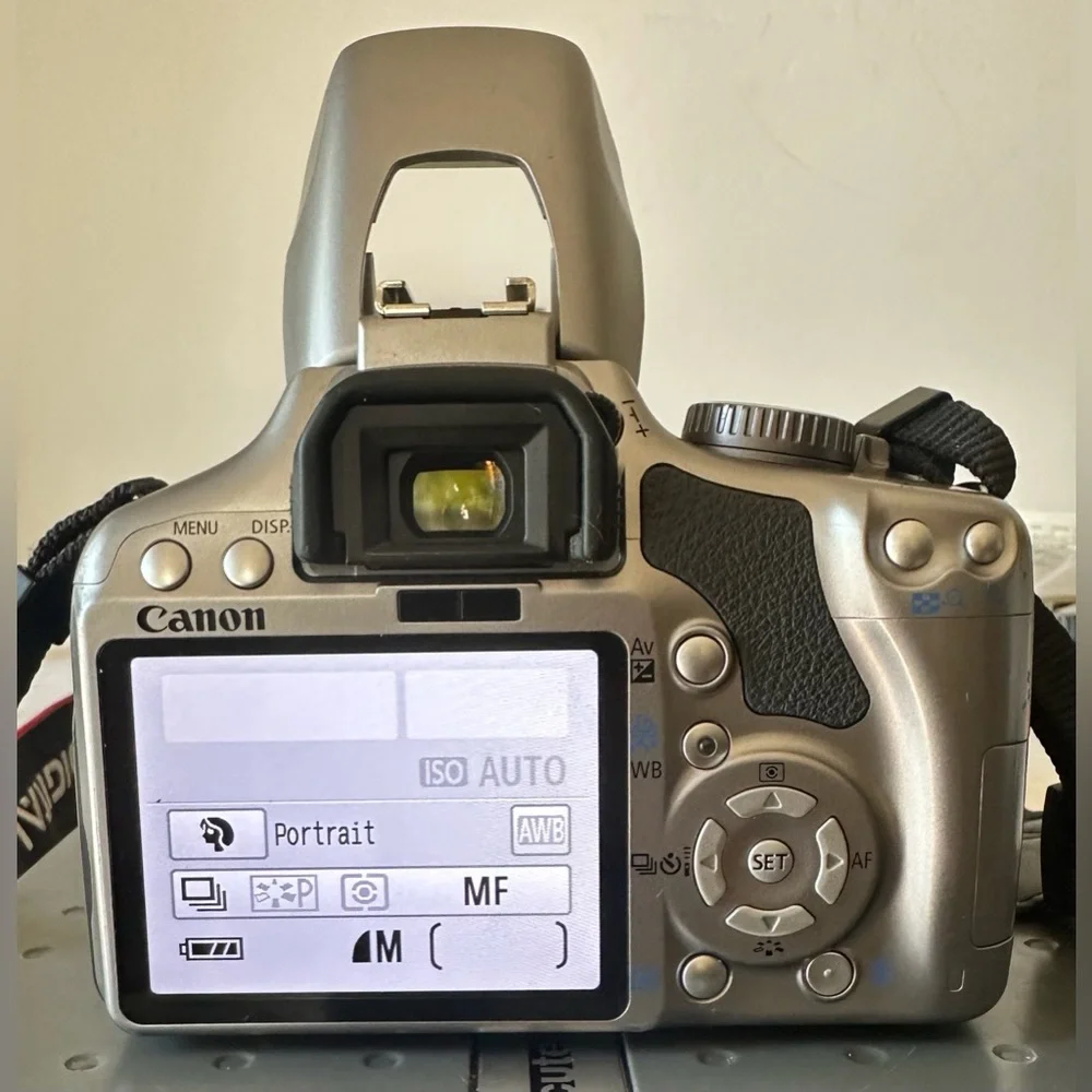 Canon EOS Rebel XSi DS126181 12.2 MP Digital SLR CMOS Camera w/ 18-55mm Lens